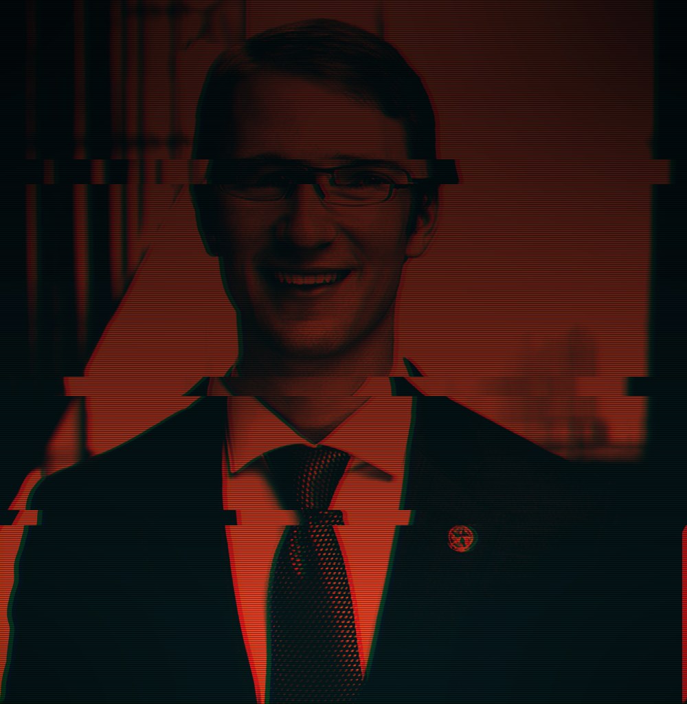 Council Member Ryan Alter, official City of Austin portrait, heavily degraded and colour-shifted.